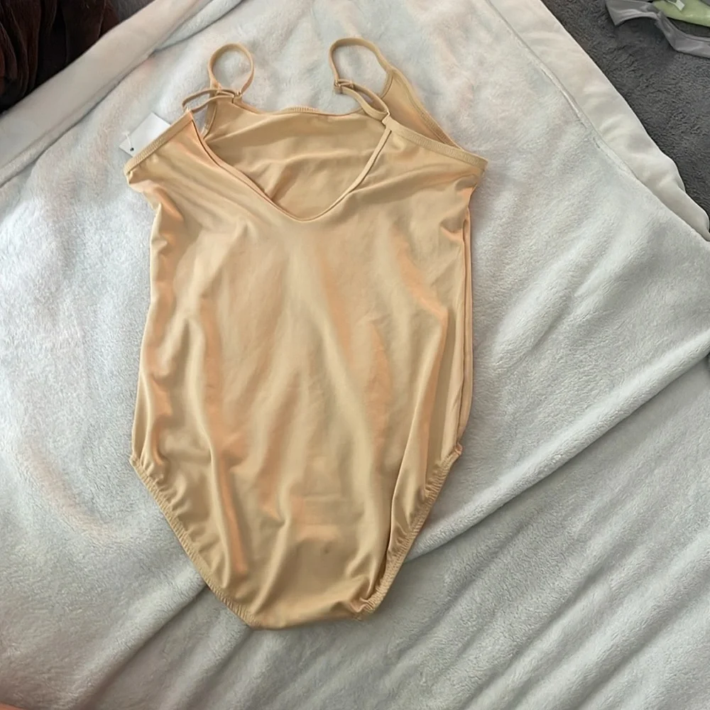 NWT youth 150 or child size 12 nude leotard for dance costumes